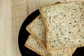 Fresh slices of wholewheat bread with various seeds and multigrain