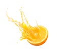 Fresh slide half of ripe orange fruit with orange juice splash water isolated on white Royalty Free Stock Photo