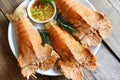 Fresh slipper lobster flathead boiled cooking with parsley rosemary vegetable salad lettuce in restaurant, Flathead lobster