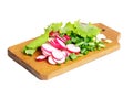 Fresh slised radish, onion and salad on cutting board Royalty Free Stock Photo