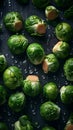 Fresh, small Brussels sprouts covered in droplets of water on dark background.