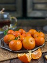 fresh small mandarin orange fruits with leaves