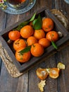 fresh small mandarin orange fruits with leaves