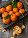 fresh small mandarin orange fruits with leaves