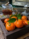 fresh small mandarin orange fruits with leaves