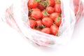 Fresh small tomatoes in plastic bag, fruit Royalty Free Stock Photo