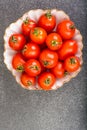 Fresh small tomatoes in white salad bowl Royalty Free Stock Photo