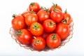 Fresh small tomatoes in white salad bowl Royalty Free Stock Photo