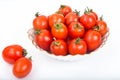 Fresh small tomatoes in white salad bowl Royalty Free Stock Photo