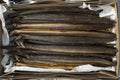 Fresh smoked eels in a cardboard box