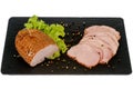 Fresh smoked ham on black board isolated. Royalty Free Stock Photo