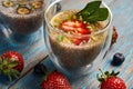 Fresh smoothie with passion fruit with currant and strawberries, close-up Royalty Free Stock Photo