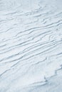 Fresh snow background texture. Winter background with snowflakes and snow mounds. Snow lumps.