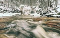 Fresh snow creating a winter scene at the Mumlavsky waterfall Royalty Free Stock Photo