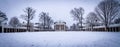 Fresh snowfall on the University of Virginia grounds. The Rotunda featured in the center