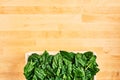 Fresh spinach leaves in wooden box Royalty Free Stock Photo