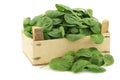 Fresh spinach leaves in a wooden box Royalty Free Stock Photo