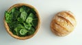 Fresh spinach in wicker basket with artisan bread for healthy eating concept Royalty Free Stock Photo
