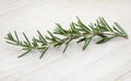 fresh sprig of rosemary on rustic wood crate Royalty Free Stock Photo