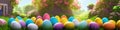 Fresh spring background with easter eggs banner green juicy meadow. Colored Easter eggs hidden flowers grass.Easter Royalty Free Stock Photo