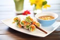 fresh spring rolls with peanut dipping sauce on a dish Royalty Free Stock Photo