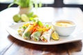 fresh spring rolls with peanut dipping sauce on a dish Royalty Free Stock Photo