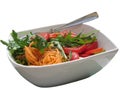 Fresh spring salad with tomatoes, rucola and carrots isolated on white