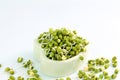 Fresh Sprouted mung beans or green gram beans in heart bowl