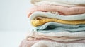 Fresh stack of light pastel colorful cotton and linen fabrics, freshness concept. Eco-laundry template. Generative AI Royalty Free Stock Photo