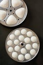 Fresh steamed Indian idly in trays Royalty Free Stock Photo