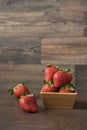 Fresh strawberries in a bamboo bowl