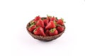 Fresh strawberries in a basket against a white background Royalty Free Stock Photo