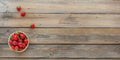 Fresh strawberries on basket top view. Healthy food on wooden table banner mock up. Delicious, sweet, juicy and ripe Royalty Free Stock Photo