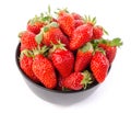 Fresh strawberries in a black cup Royalty Free Stock Photo