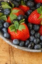 Fresh Strawberries and Blueberries in Colander Royalty Free Stock Photo