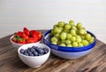 Fresh strawberries, blueberries and grapes Royalty Free Stock Photo