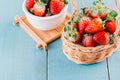 Fresh strawberries in a bowl on wooden table Royalty Free Stock Photo