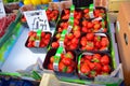 Fresh strawberries in boxes selling at Portobello Market in Portobello Road, Notting Hill, UK