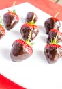 Fresh strawberries covered with dark chocolate Royalty Free Stock Photo