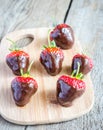 Fresh strawberries covered with dark chocolate Royalty Free Stock Photo