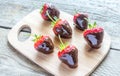 Fresh strawberries covered with dark chocolate Royalty Free Stock Photo