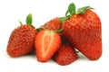 Fresh strawberries and a cut one Royalty Free Stock Photo