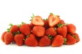 Fresh strawberries and a cut one Royalty Free Stock Photo