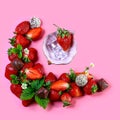 The fresh strawberries frame on a pink background. copy space Royalty Free Stock Photo