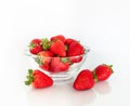 Fresh Strawberries in a Glass Bowl Isolated on a White Background. Royalty Free Stock Photo