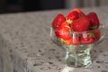 Fresh strawberries in glass bowl. Ripe strawberry closeup. Sweet summer harvest. Juicy dessert. Healthy food. Red berries in vase. Royalty Free Stock Photo