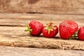 Fresh strawberries on old wood. Royalty Free Stock Photo