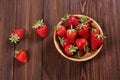 Fresh strawberries on an old wooden surface. Royalty Free Stock Photo