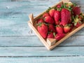 Fresh strawberries on an old wooden surface Royalty Free Stock Photo