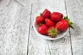 Fresh strawberries on old wooden white table